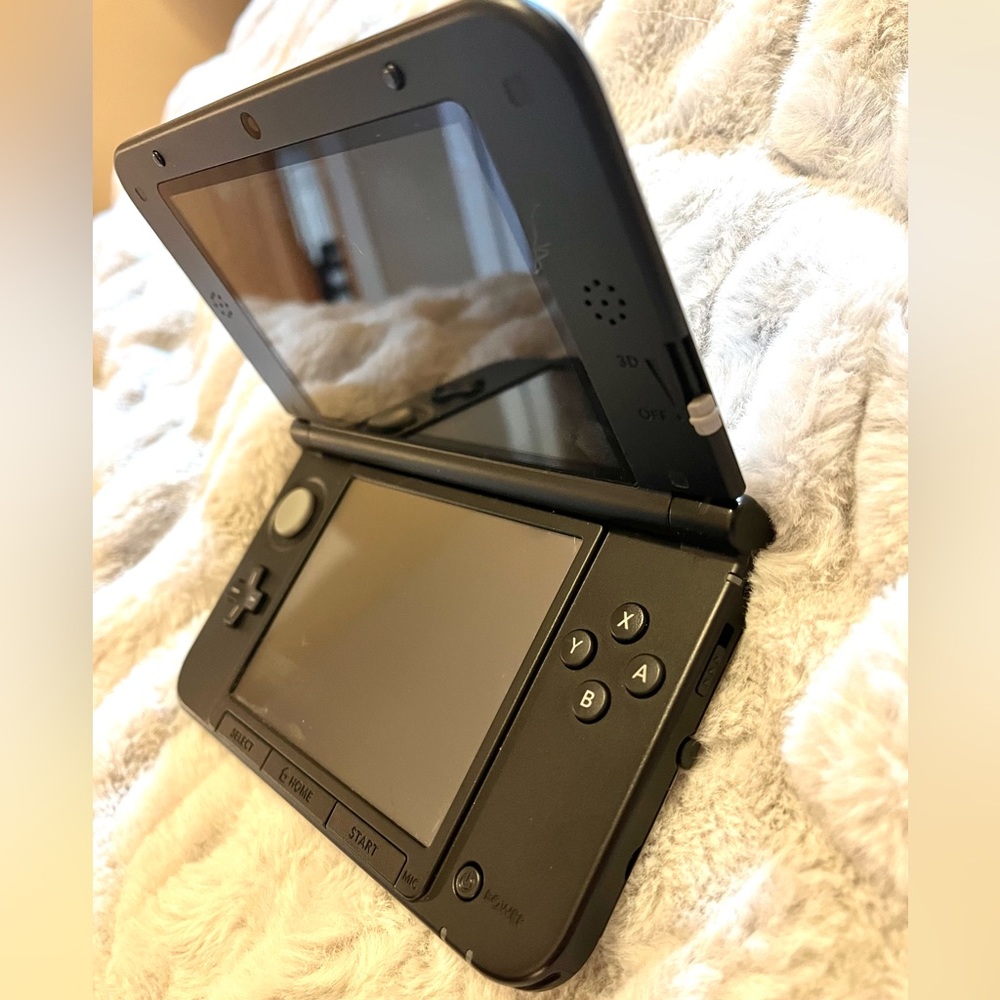 Mario & Luigi 3DS XL with UNOPENED Pokémon Sun & Stylus.